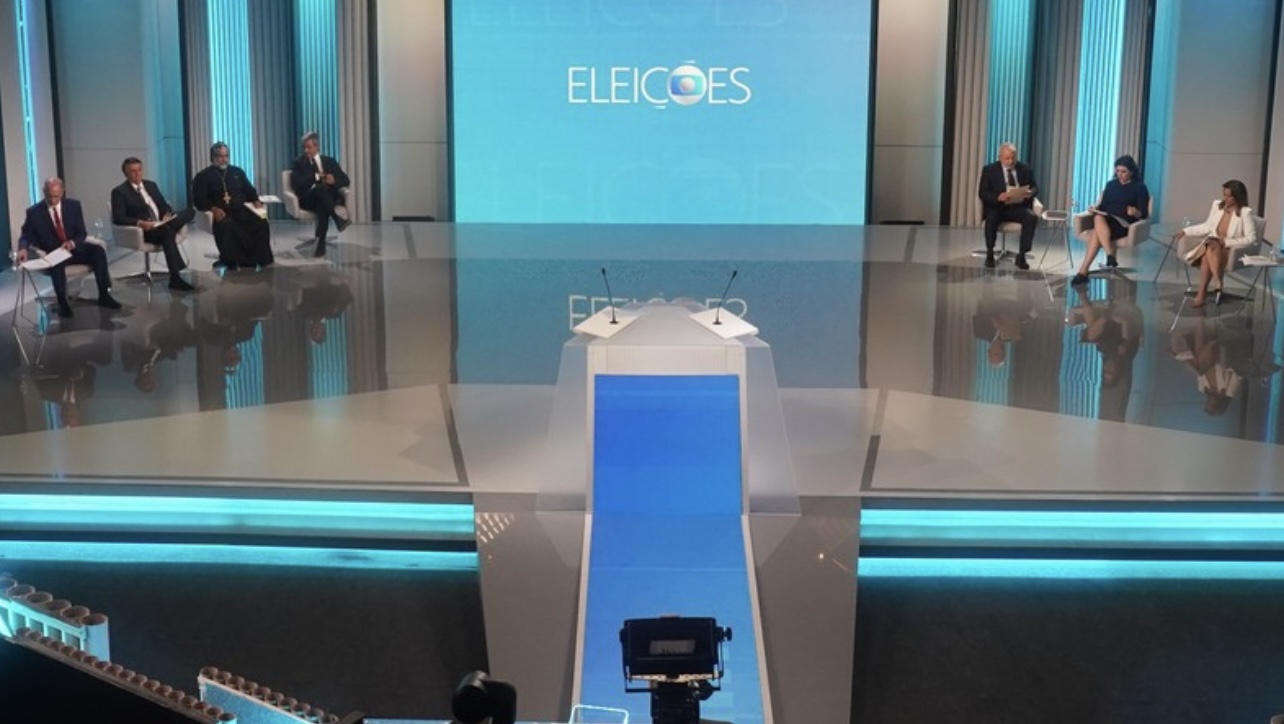 InfoMoney | Lula e Bolsonaro trocam ataques sobre corrupção em duelo com “enxurrada” de direitos de resposta em debate da TV Globo